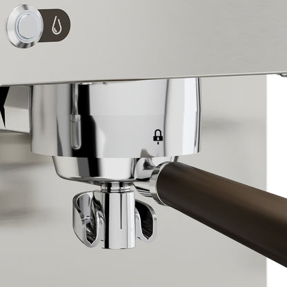Close-up of a coffee machine's brewing group with a white background