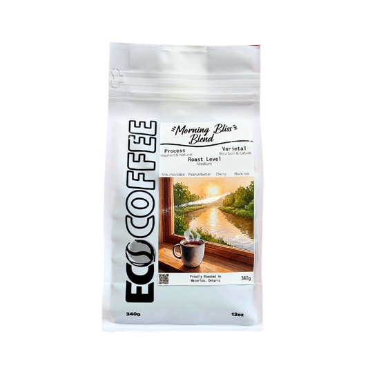 A 340g white stand-up pouch of ECO COFFEE Morning Bliss Blend, featuring a scenic window view illustration on the front label.