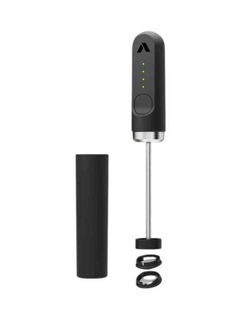 Black handheld milk frother with attachments on a white background