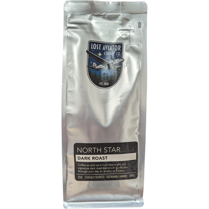 A package of Lost Aviator North Star Dark Roast coffee, showing the brand logo and the product name with a weight indication of 340g.