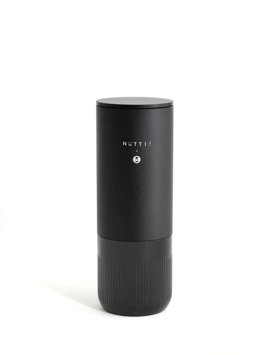 Black portable espresso machine in closed position with 'NUTTII' branding on a white background