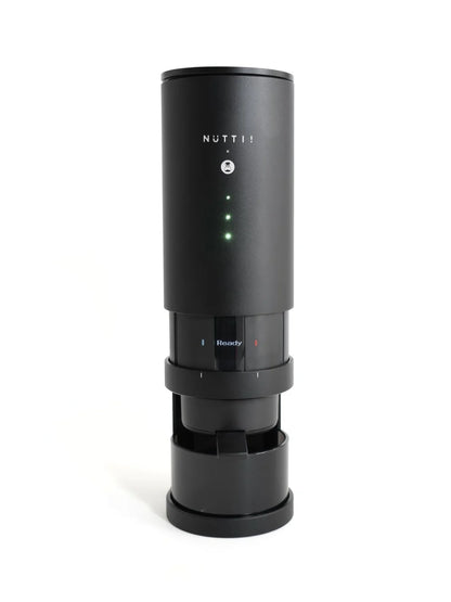 Slim, black espresso machine with 'NUTTII' branding on a white background