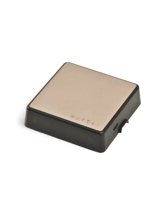 Rectangular scale with 'NUTTII' branding on a white background