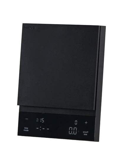 Black Hario coffee scale side tilt on a white background