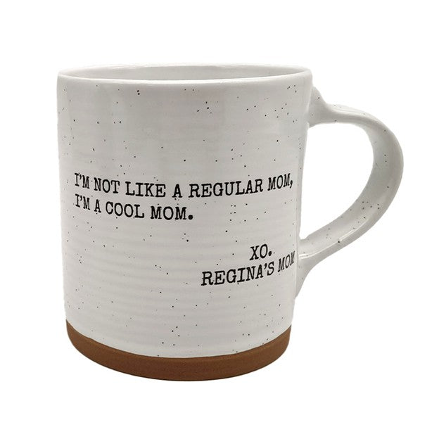 White mug with text 'I'm not like a regular mom, I'm a cool mom. Xo. Regina's Mom' on a white background