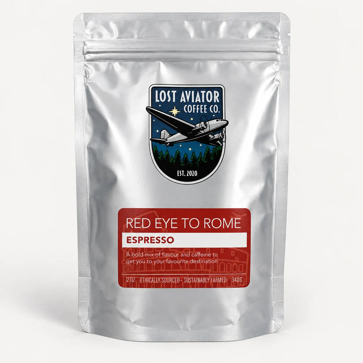 A silver stand-up pouch of Lost Aviator Coffee Co. Red Eye to Rome Espresso coffee, featuring a black and red logo and label on a clean white background.