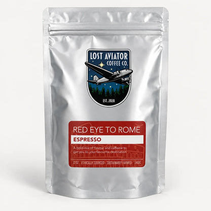 A silver stand-up pouch of Lost Aviator Coffee Co. Red Eye to Rome Espresso coffee, featuring a black and red logo and label on a clean white background.