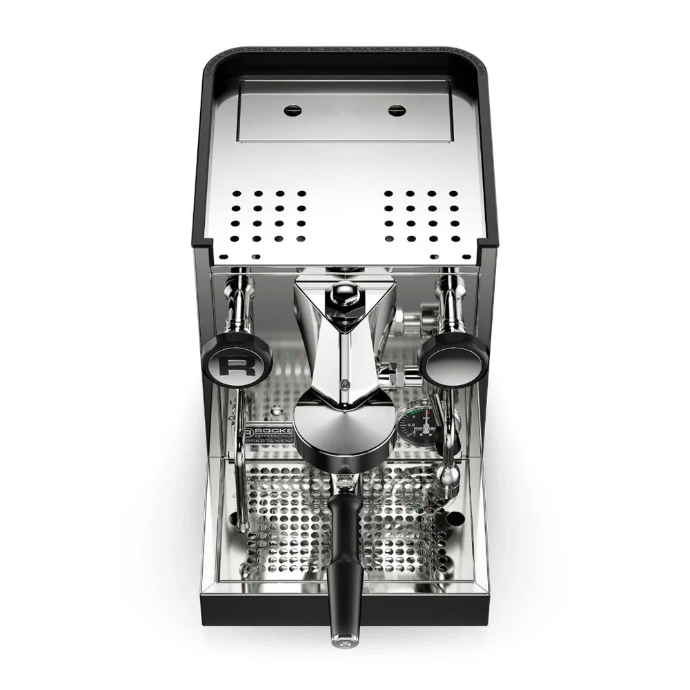 Top view of an espresso machine with a white background