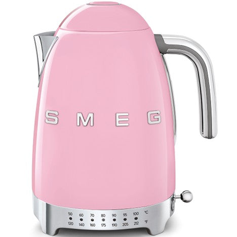 Pink Smeg kettle on a white background