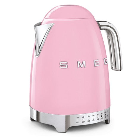 Pink Smeg kettle on a white background