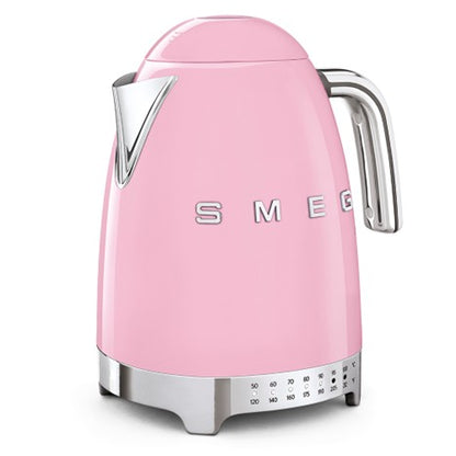 Pink Smeg kettle on a white background