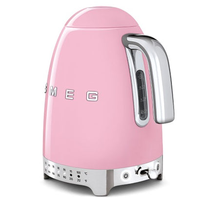 Pink Smeg kettle on a white background