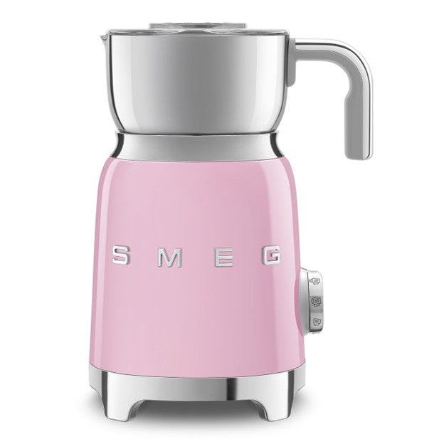 Pink Smeg kettle on a white background