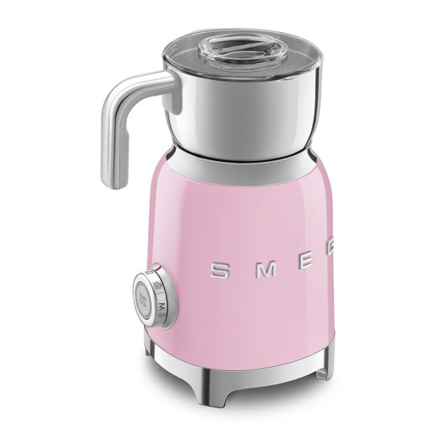 Pink Smeg kettle on a white background