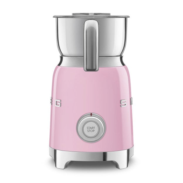 Pink Smeg kettle on a white background