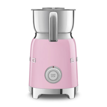 Pink Smeg kettle on a white background