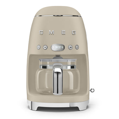 Beige Smeg coffee machine on a white background