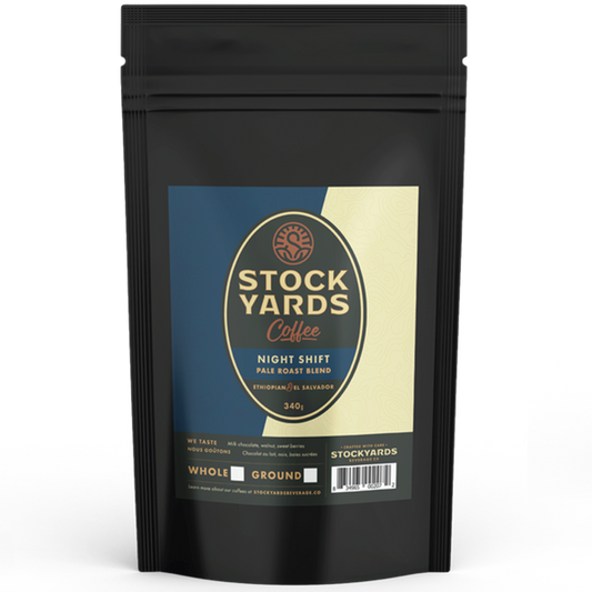 Black coffee packaging with 'Stockyards Coffee' label on a white background