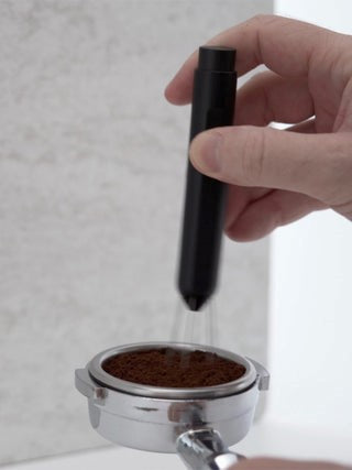 Subminimal Flick real life used to prepare coffee puck in portafilter