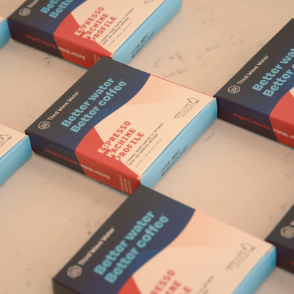 Multiple boxes of Third Wave Water on a light surface