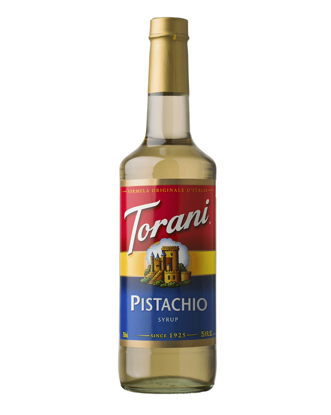 Torani Pistachio syrup bottle on a white background