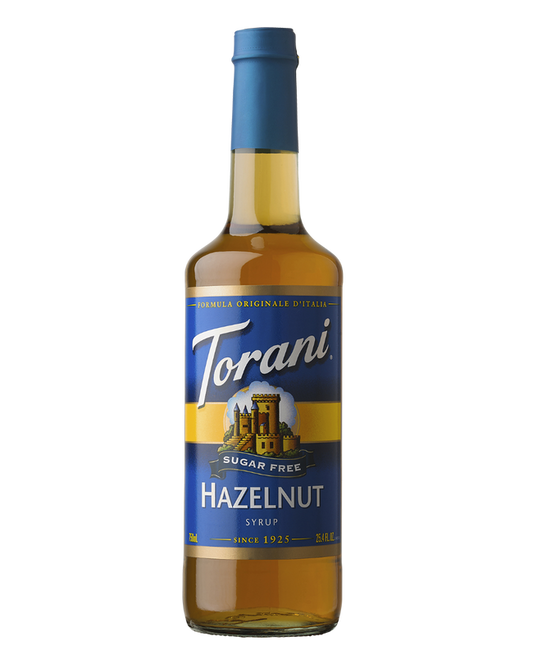 Torani Sugar Free Hazelnut, Glass bottle with Blue Lable, Image of castle on bottle lable with gold bands.
