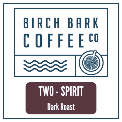 A square coffee label design for Birch Bark Coffee Co, featuring the brand name in dark blue text at the top, simple blue line icons below, and a dark mauve rectangle at the bottom with white text reading 'TWO - SPIRIT' and 'Dark Roast'.