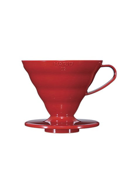 Red coffee filter with 'Hario' branding on a white background