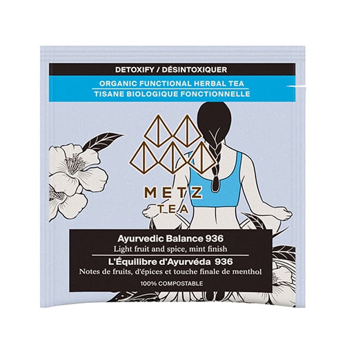 Metz Tea package with a person meditating and floral elements on a white background