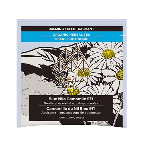 Tea bag packaging with floral design and text on a white background
