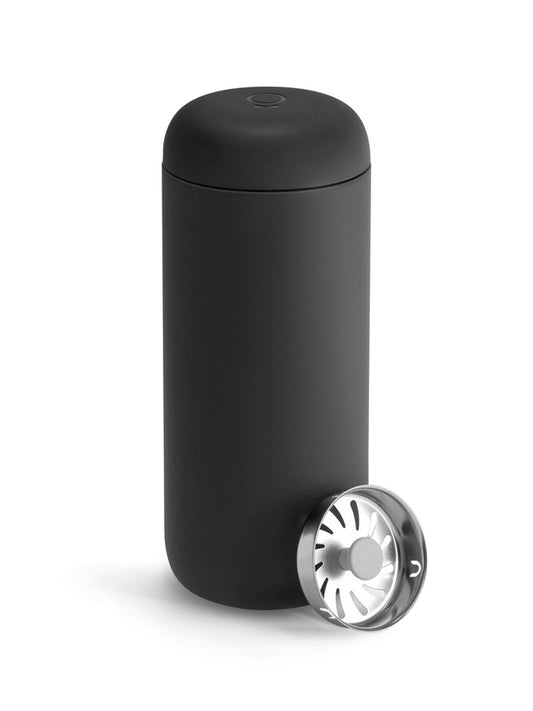 Black travel mug on a white background