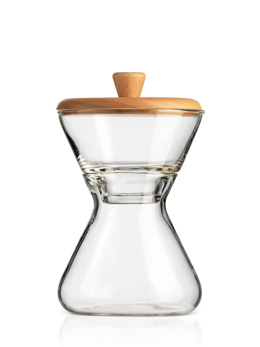 Clear glass hourglass-shaped coffee carafe with a light natural wood lid and matching wooden handle, shown on a white background.