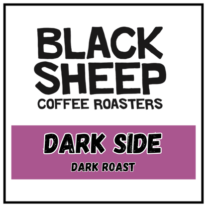 A square coffee roaster label design with a white background, black border, large black text reading 'BLACK SHEEP COFFEE ROASTERS,' and a purple band across the lower half reading 'DARK SIDE DARK ROAST.'.
