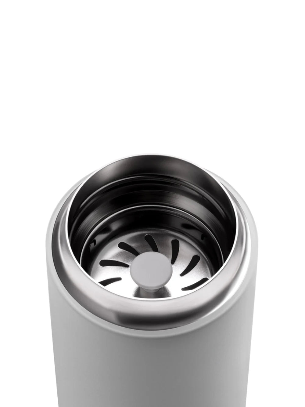 Close-up of a grey travel mug with a silver interior and metal splash guard on a white background