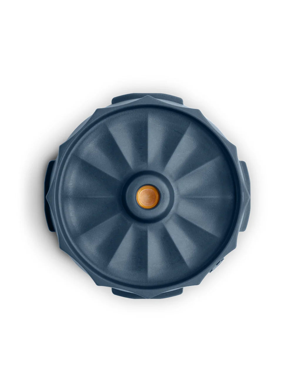 A top-down view of a dark slate blue circular lid with a textured radial pattern and a small orange accent in the center, set against a plain white background.