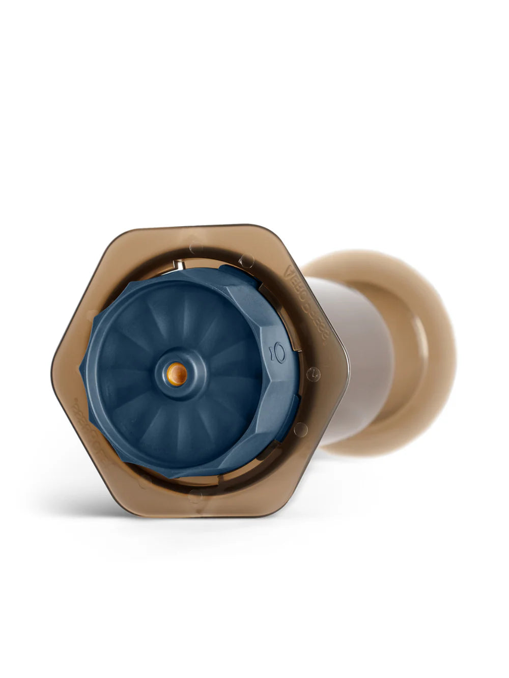 A close-up of a hexagonal bottle stopper with a translucent brown outer ring, a dark blue textured inner ring, and a white cylindrical core, shown on a white background.