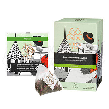 Box of tea with a women wearing a hat looking out at a building