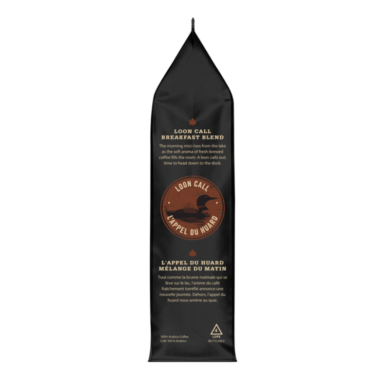 A tall black coffee bag labeled 'Loon Call Breakfast Blend' with white text and a circular brown logo on the front, shown against a plain white background.