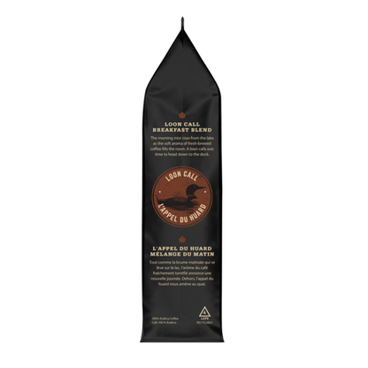 A tall black coffee bag labeled 'Loon Call Breakfast Blend' with white text and a circular brown logo on the front, shown against a plain white background.