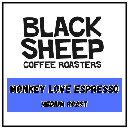 A square coffee label design with a white background, black border, and black text reading 'BLACK SHEEP COFFEE ROASTERS' at the top and 'MONKEY LOVE ESPRESSO MEDIUM ROAST' inside a blue block at the bottom.