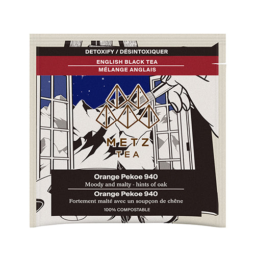 Orange Pekoe tea bag with image of window and mountains