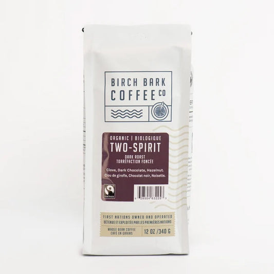 A bag of Birch Bark Coffee Co. Two-Spirit organic biodegradable dark roast coffee on a clean white background.